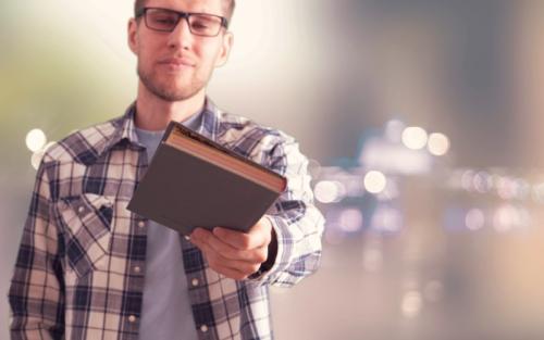 person-holding-giving-book-share-present-knowledge (1)